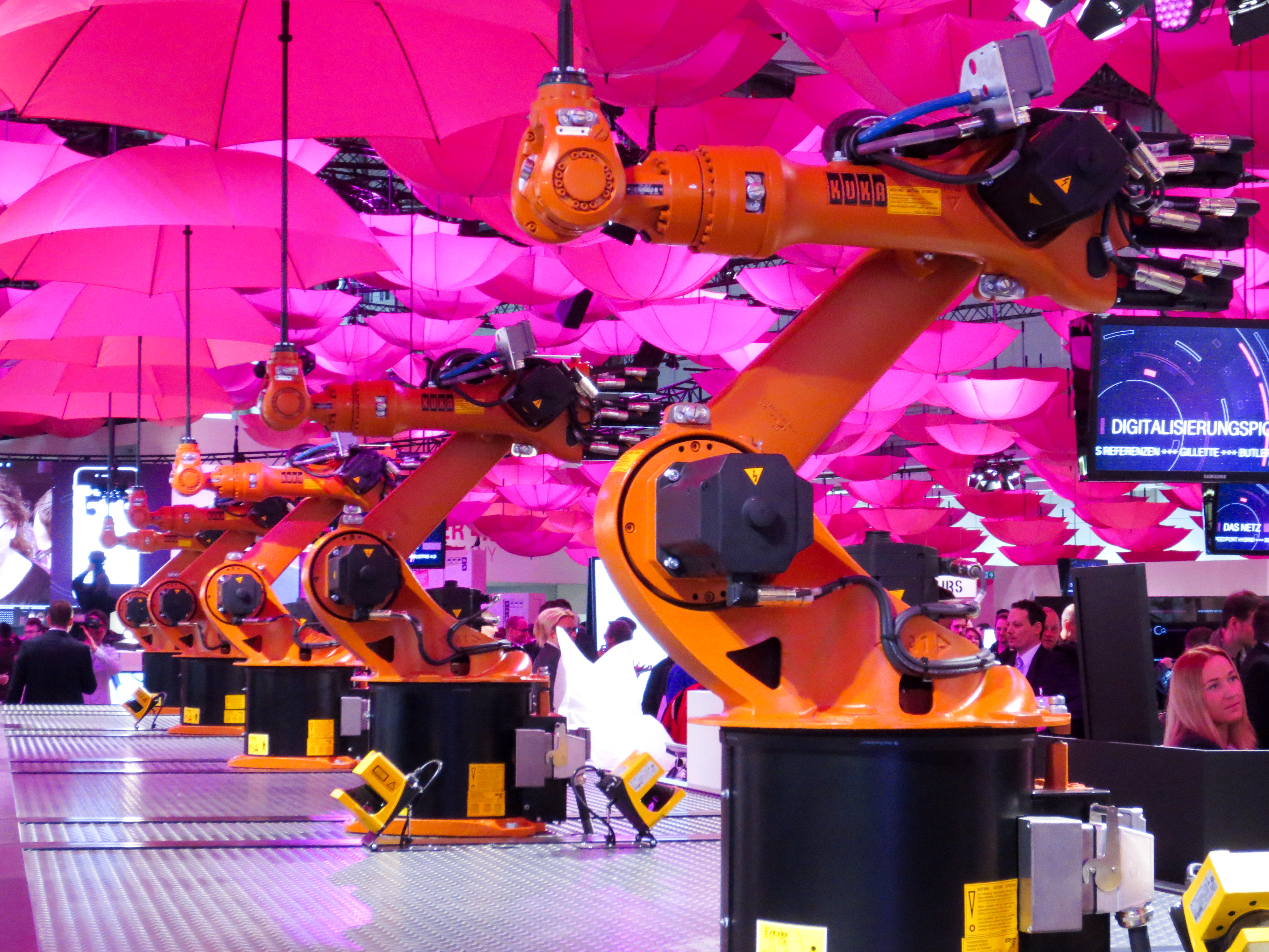 An industrial robot at CeBIT 2015, used as a licensed contextual illustration of automated systems.