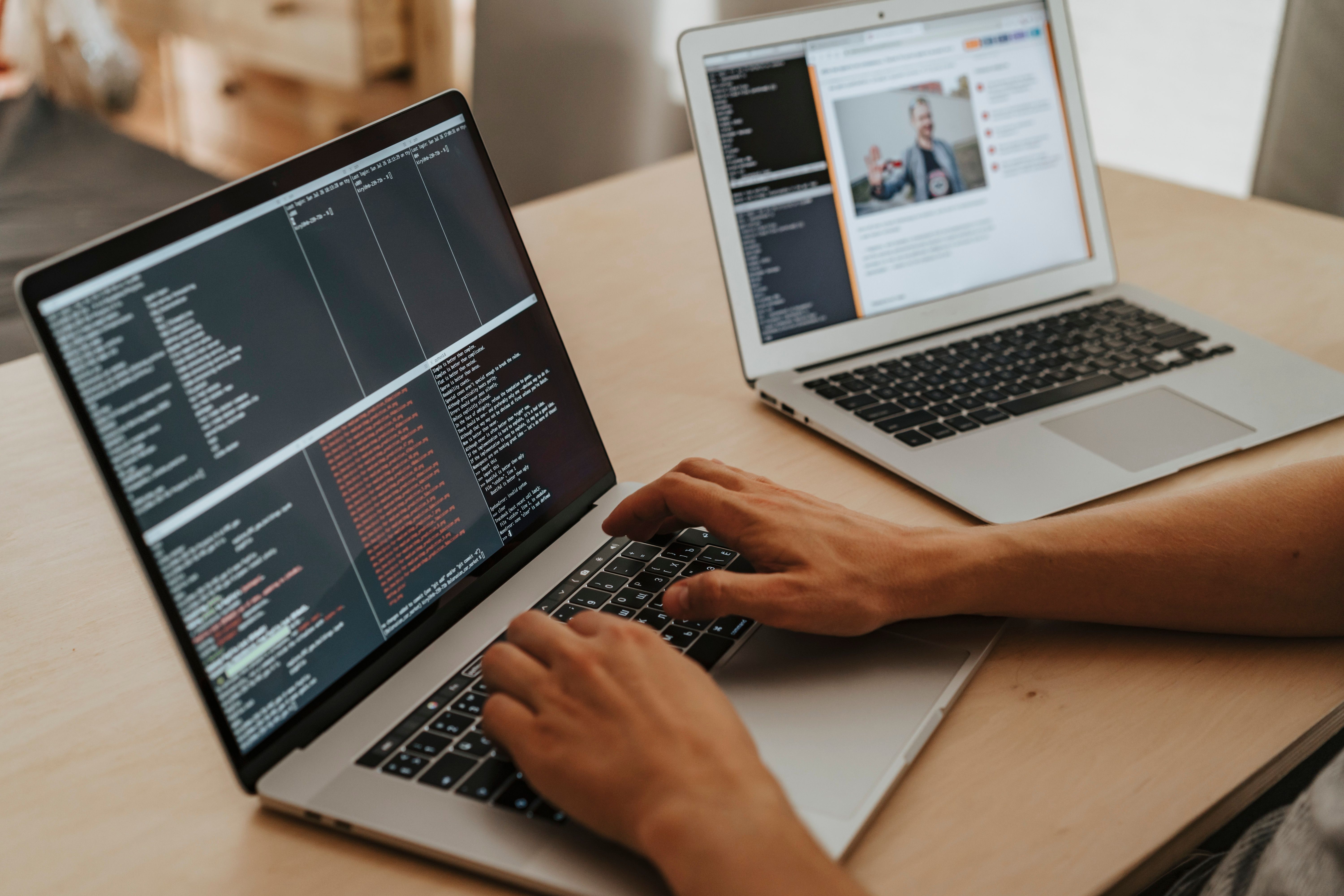 Developer working at a laptop in a workspace