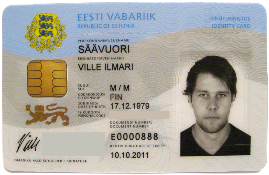 Photograph of an official European national smart identity card displaying printed identity attributes and an embedded cryptographic chip