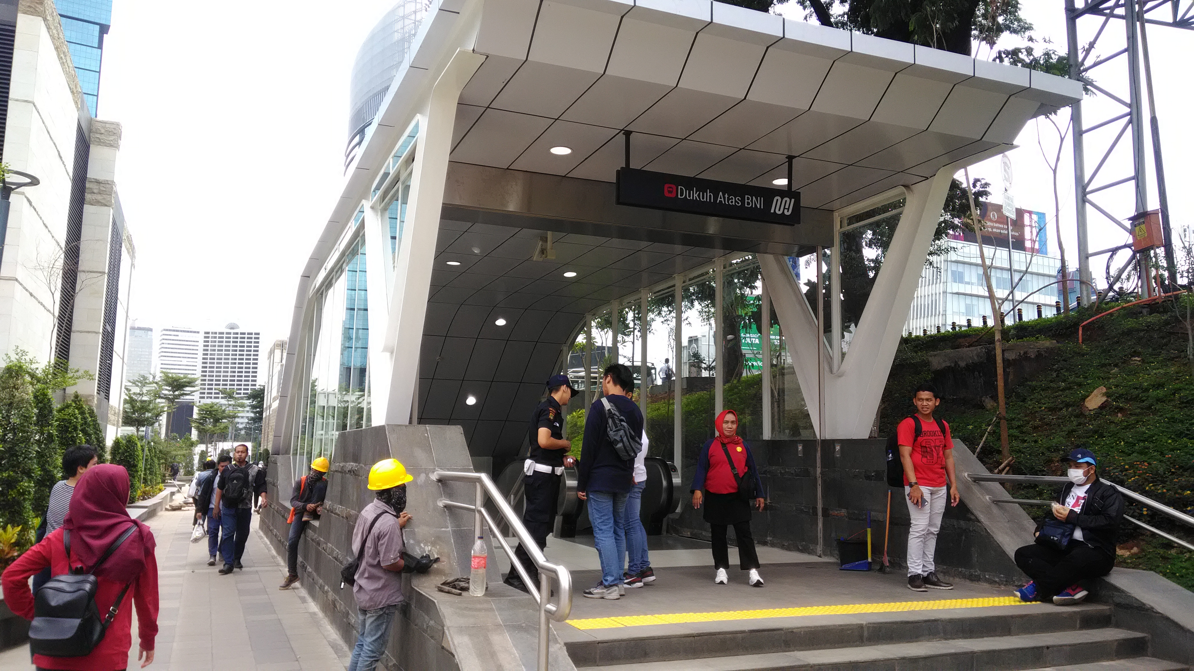 Interior concourse of Dukuh Atas MRT Jakarta Station showing clean transit infrastructure and passenger concourses.