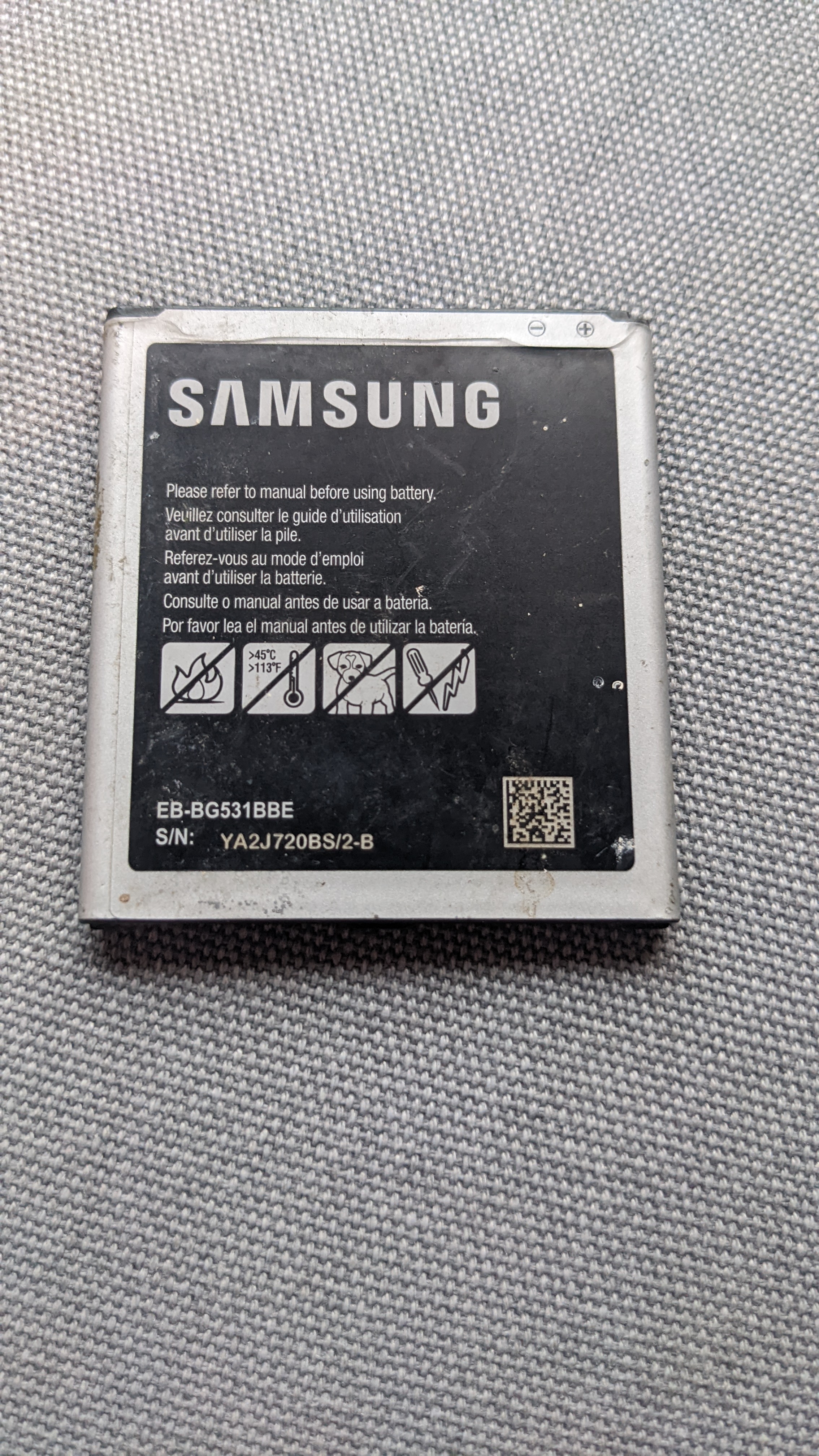 Standard smartphone lithium-ion pouch battery cell showing technical specifications and voltage ratings