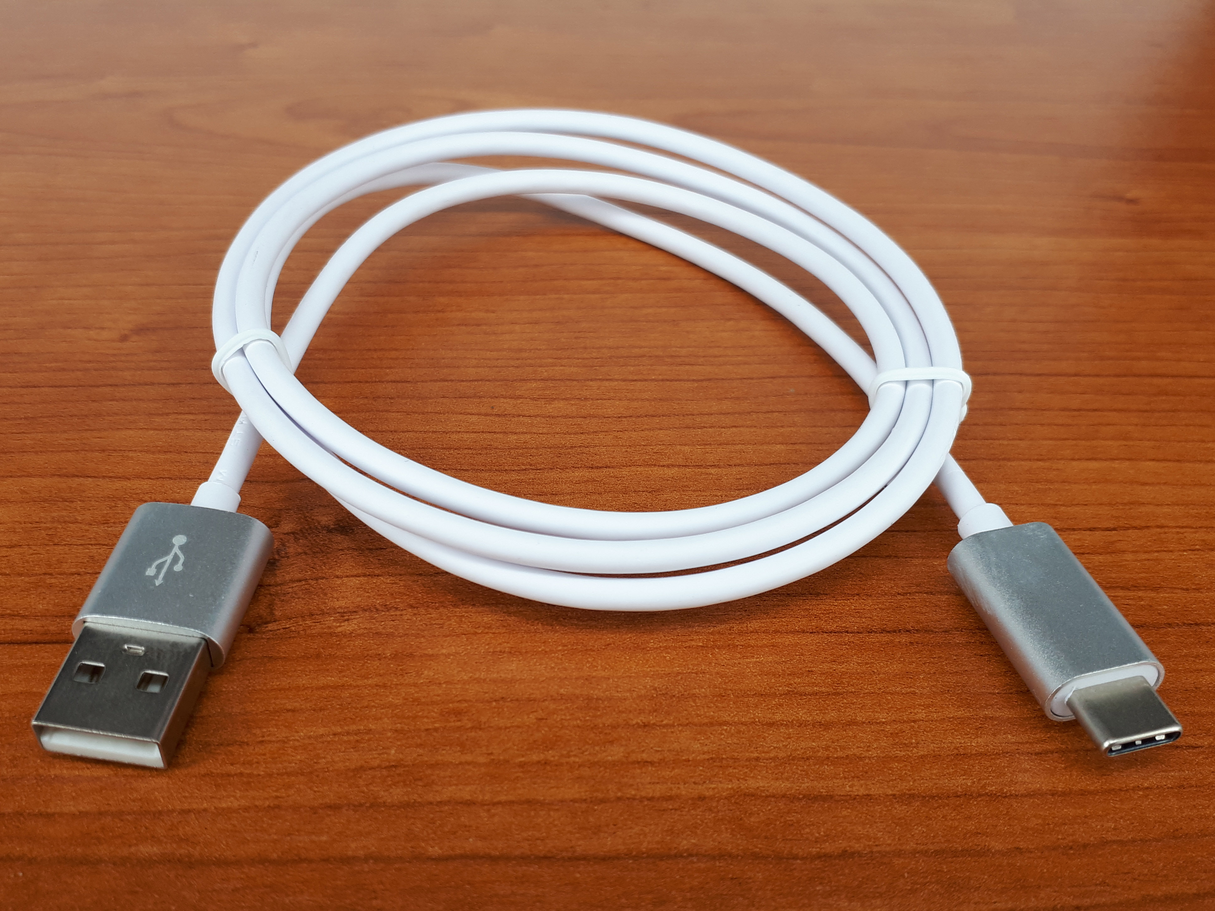 A USB-C cable photographed against a plain background.